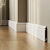 Напольный плинтус Quick-Step белый из HD полимера QSSKRW51100